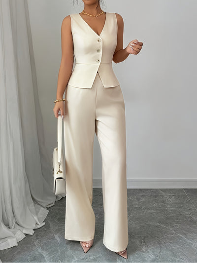 Elegante blouse en broekset met clutch,